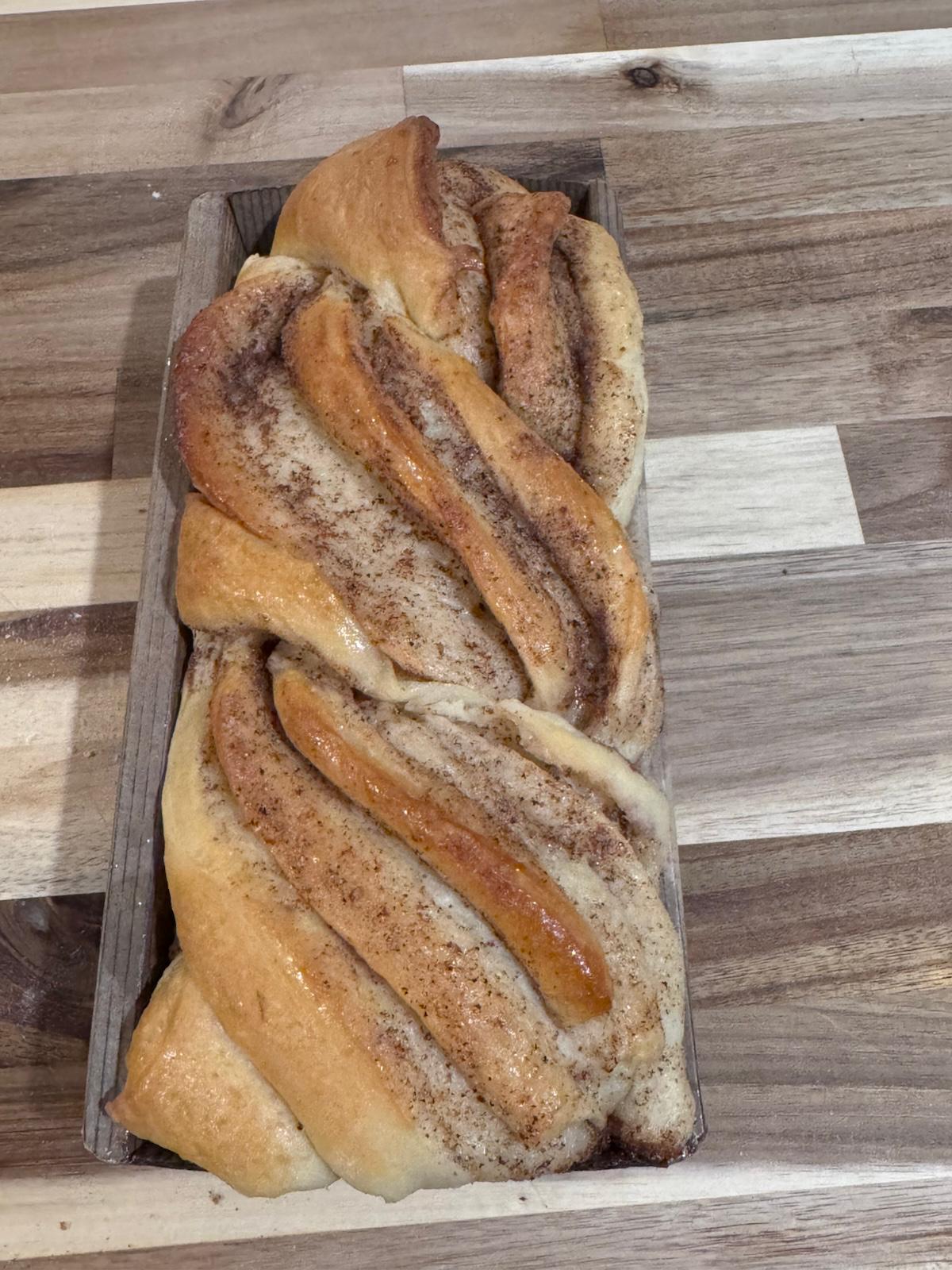 Cardamom Cinnamon Babka, braided loaf with cinnamon swirl, fresh from the oven