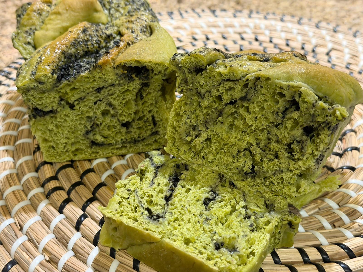 Matcha Black Sesame Babka sliced, showing green matcha crumb swirled with black sesame